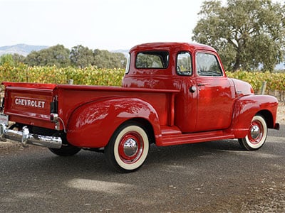 red 1951 Chevrolet pickup